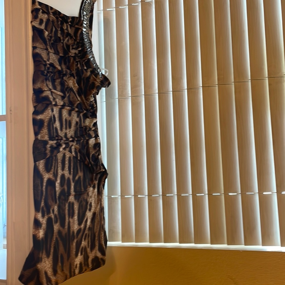 Adorable and fashionable prehistoric looking dress in animal print
